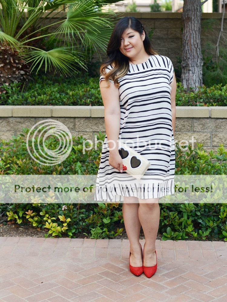 Curvy Girl Chic Plus Size Fashion Blog Striped Eloquii Dress and Kate Spade Clutch