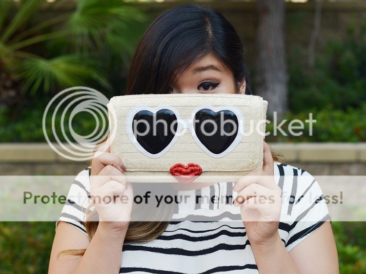 Curvy Girl Chic Plus Size Fashion Blog Striped Eloquii Dress and Kate Spade Clutch